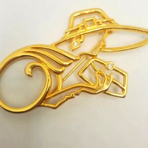 Lady Remington brooch. Excellent vintage condition. For lapel, vest, scarf.